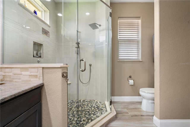 1422 Via Milanese, Punta Gorda, FL 33950 - bathroom with vanity, a shower stall, and wood finished floors