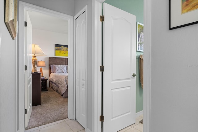 1422 Via Milanese, Punta Gorda, FL 33950 - hallway with light tile patterned floors and light colored carpet