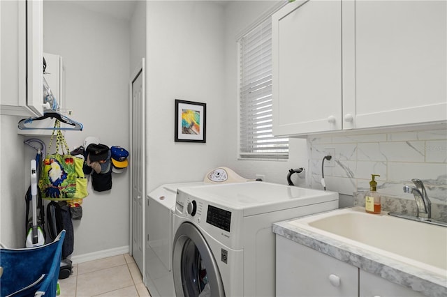 1422 Via Milanese, Punta Gorda, FL 33950 - laundry room featuring cabinet space, washing machine and dryer, and light tile patterned floors