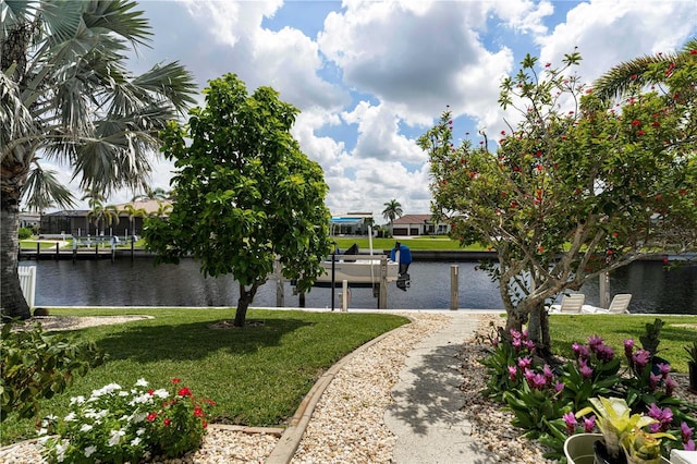 1422 Via Milanese, Punta Gorda, FL 33950 - dock area featuring a water view, a yard, and boat lift