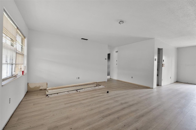 3207 Chariot Pl, Orlando, FL 32818 - unfurnished room featuring wood finished floors