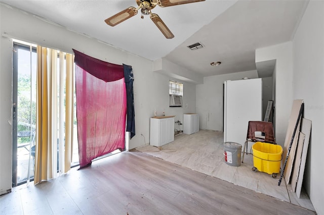 3207 Chariot Pl, Orlando, FL 32818 - interior space with wood finished floors, ceiling fan, and cooling unit