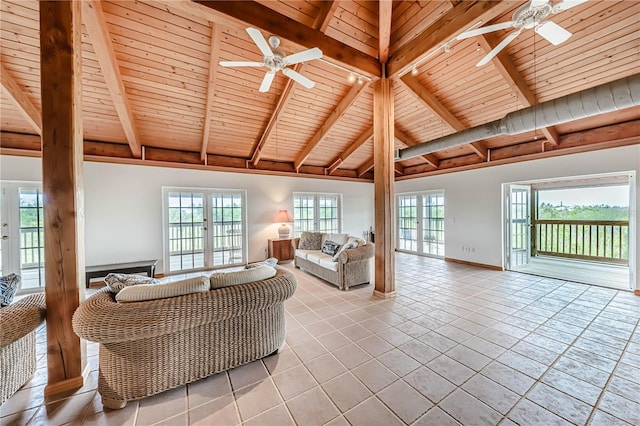 living room with wood ceiling, beamed ceiling, and tile patterned floors