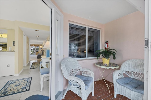 interior space featuring light tile floors