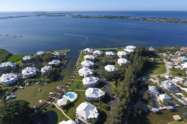 bird's eye view with a water view