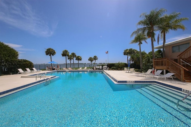 view of pool featuring a patio