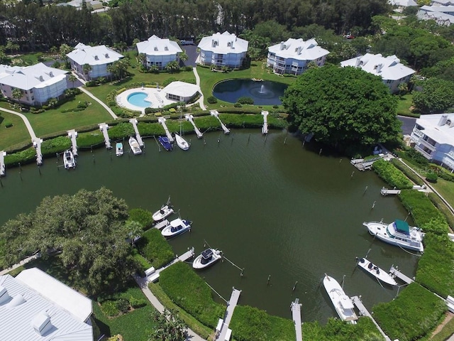 drone / aerial view with a water view