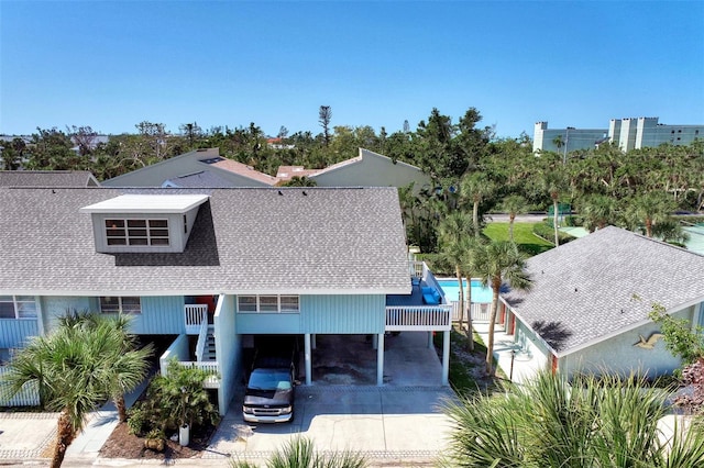 view of front of home with a carport