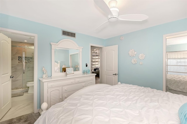 carpeted bedroom with connected bathroom and ceiling fan