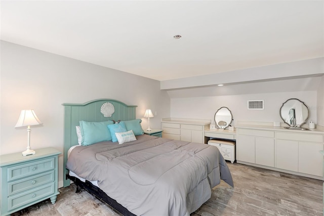 bedroom featuring light wood-type flooring