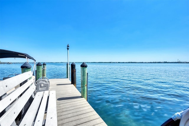 view of dock with a water view