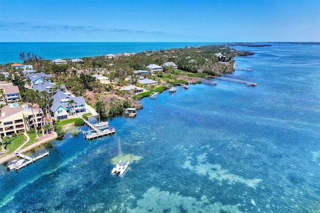 drone / aerial view with a water view