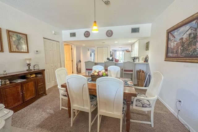 view of carpeted dining room