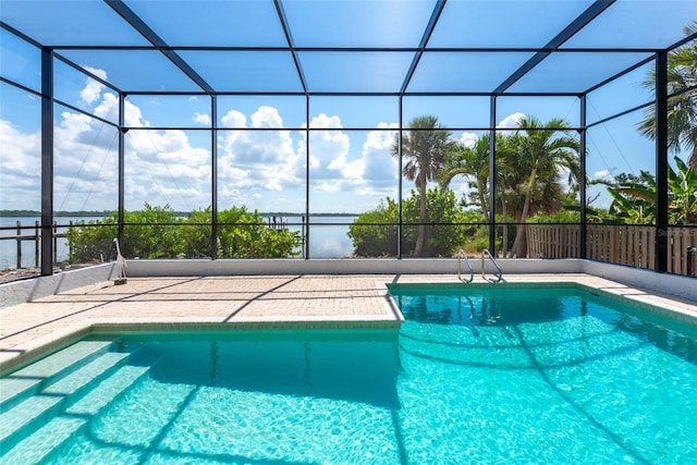 view of pool with a lanai