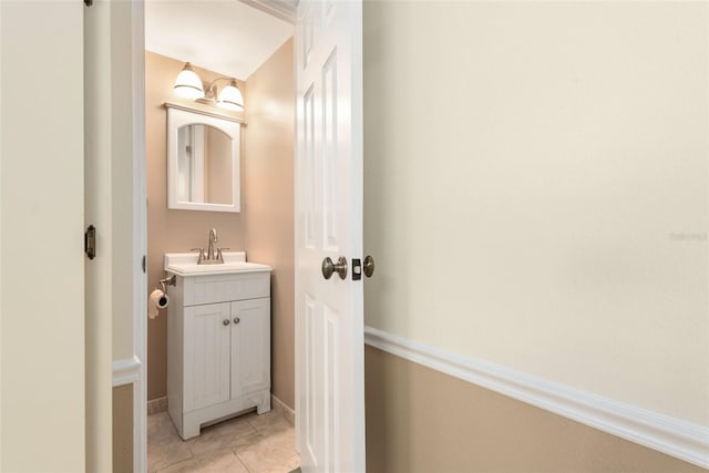 bathroom featuring vanity and tile floors