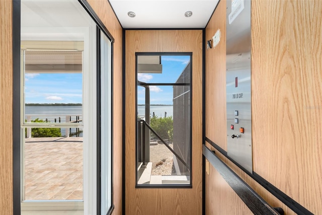 entryway featuring a water view