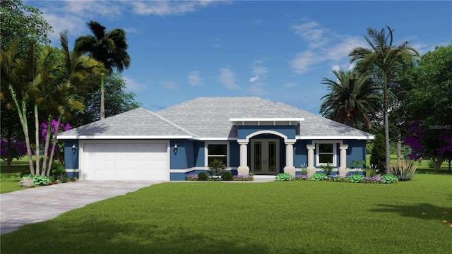 view of front of property featuring a garage and a front yard