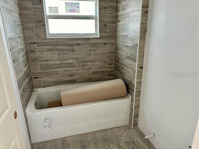 bathroom featuring wood-type flooring