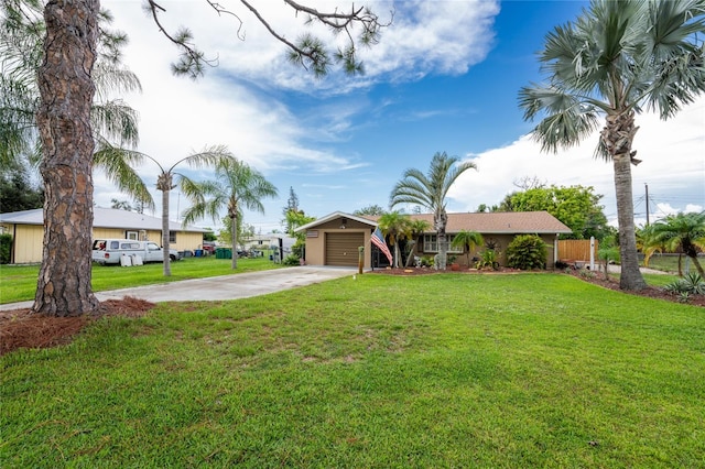 single story home with a garage and a front yard