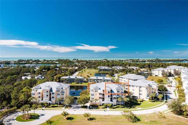 drone / aerial view with a water view