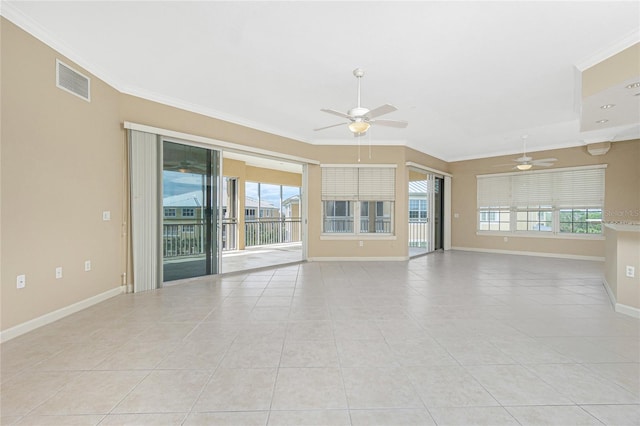 unfurnished living room featuring crown molding, ceiling fan, and light tile floors