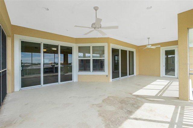 view of patio with ceiling fan