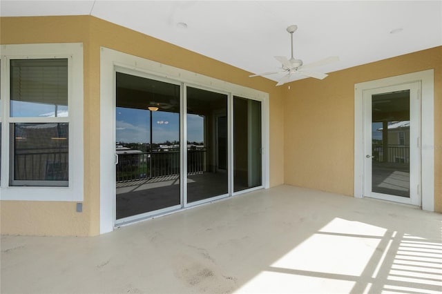 view of patio / terrace featuring ceiling fan