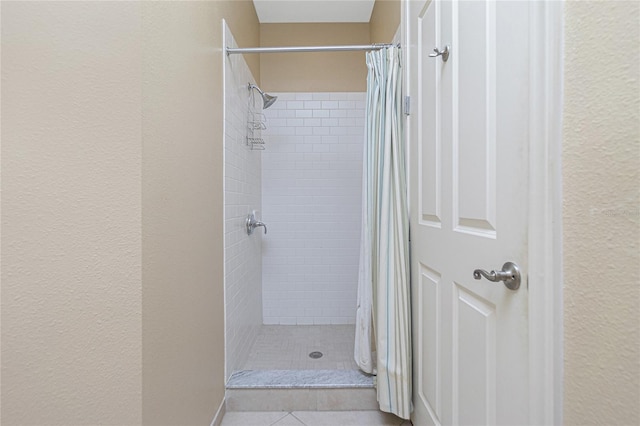 bathroom with a shower with curtain