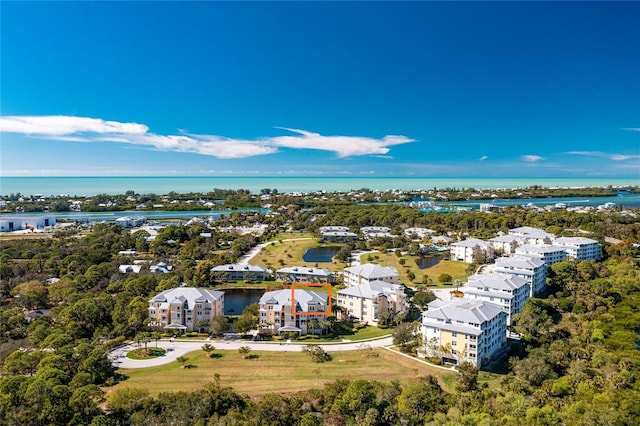 drone / aerial view with a water view