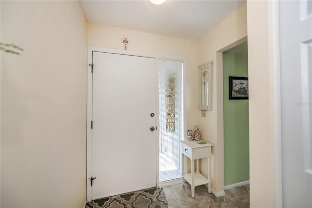 view of tiled foyer