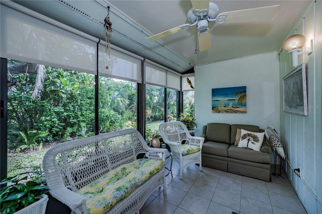 sunroom featuring ceiling fan