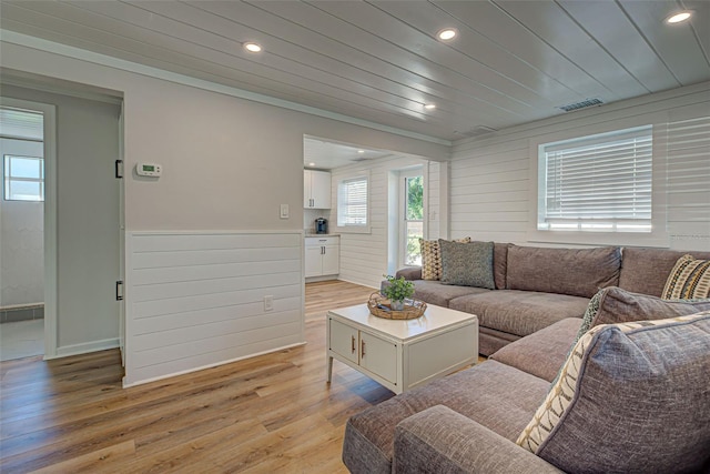 living room with light hardwood / wood-style floors