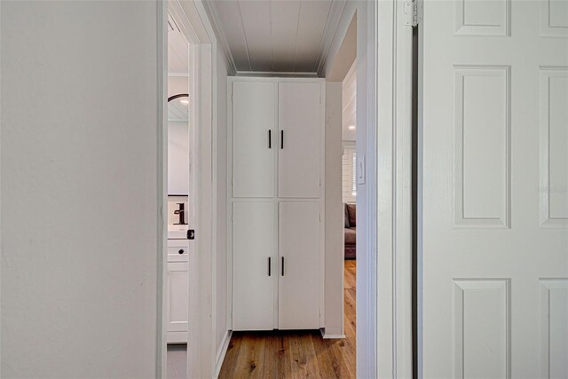 corridor featuring light hardwood / wood-style floors