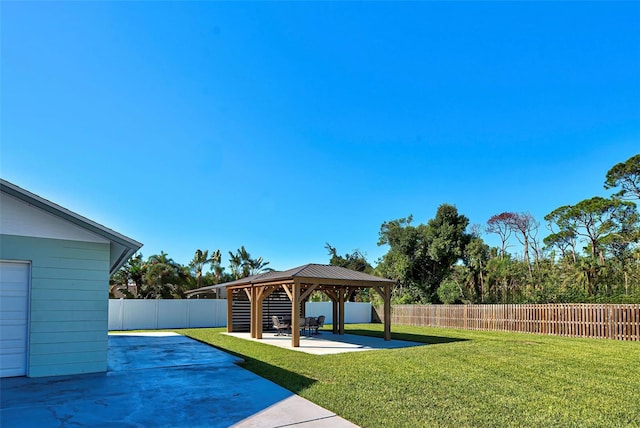 view of yard with a gazebo and a patio area