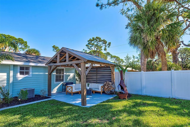 view of yard with a gazebo, an outdoor hangout area, and a patio