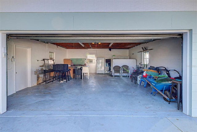 garage featuring white refrigerator