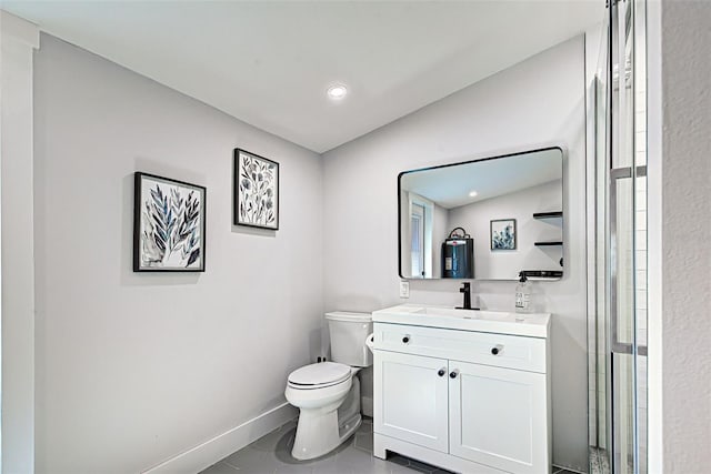 bathroom featuring oversized vanity, toilet, vaulted ceiling, and tile flooring