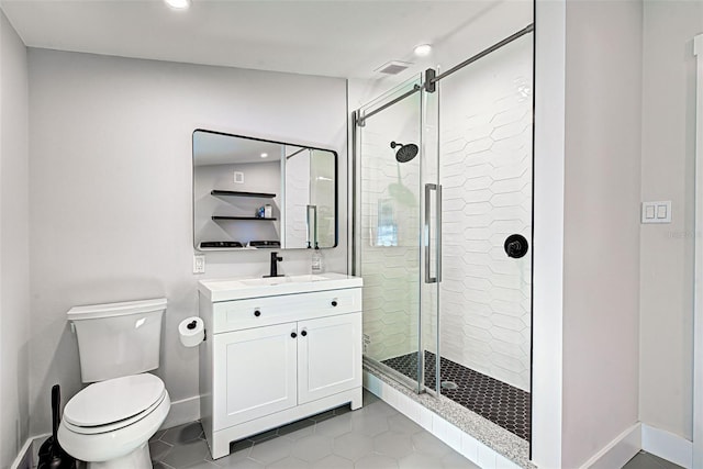 bathroom with toilet, tile flooring, an enclosed shower, and vanity