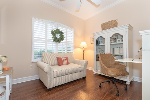 living area featuring ornamental molding, ceiling fan, and dark hardwood / wood-style floors