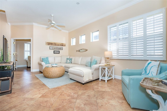 living room with ceiling fan, crown molding, a wealth of natural light, and light tile flooring