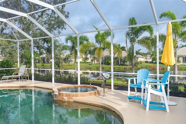 view of swimming pool with a lanai, an in ground hot tub, and a patio