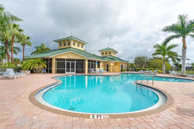 view of swimming pool featuring a patio