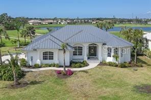 view of front of property featuring a water view and a front yard