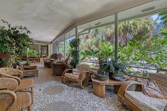 sunroom / solarium with vaulted ceiling