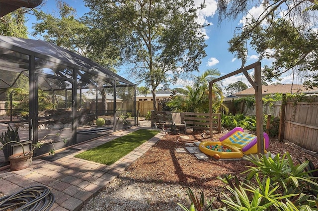 view of yard featuring a patio area and a fenced backyard