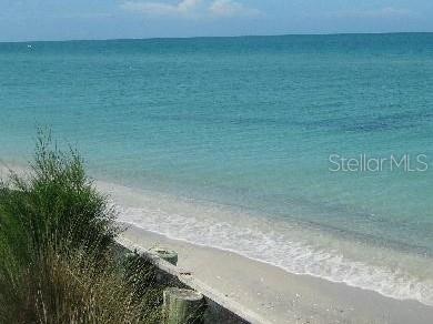 property view of water with a beach view