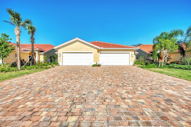 view of front of home with a garage