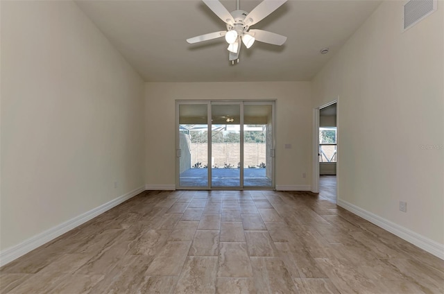 empty room featuring ceiling fan