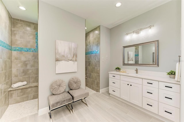 bathroom featuring tile floors and large vanity