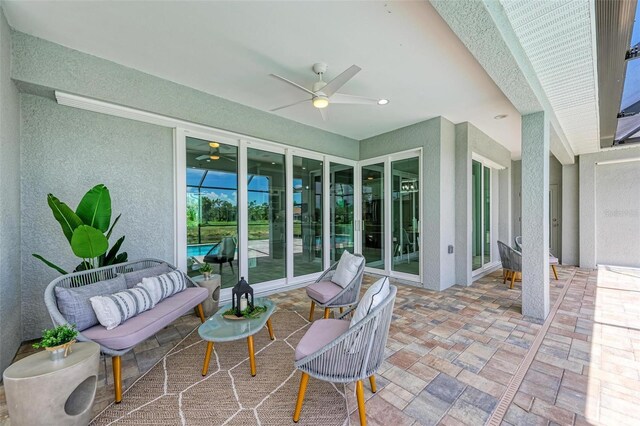 view of patio / terrace with outdoor lounge area and ceiling fan